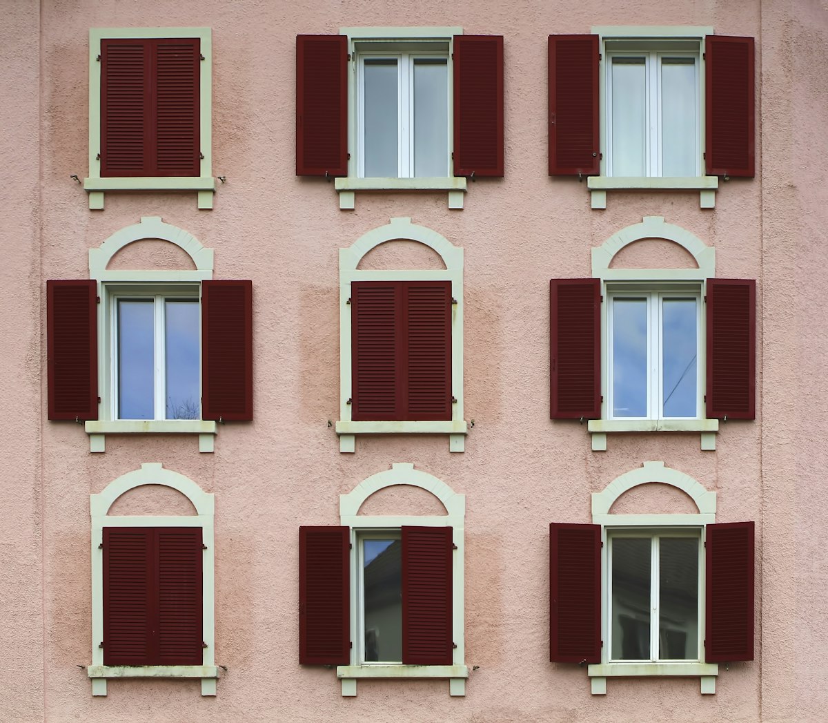 red wooden windows related to Enhance Your Window Style with Valance Clips for Horizontal Blinds
