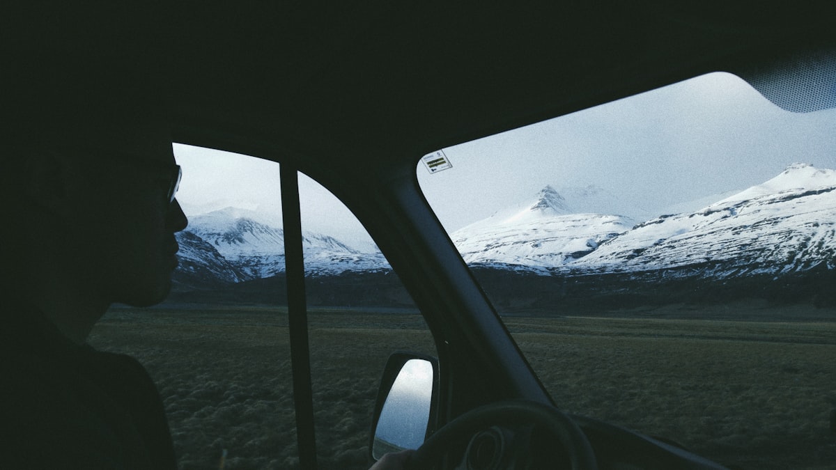 Road tripping Iceland and figured I'd take this shot of my mate, driving for ages and the views were absolutely stunning. One of the best drives I've had period.  related to Exploring the World of Cars Window Valances