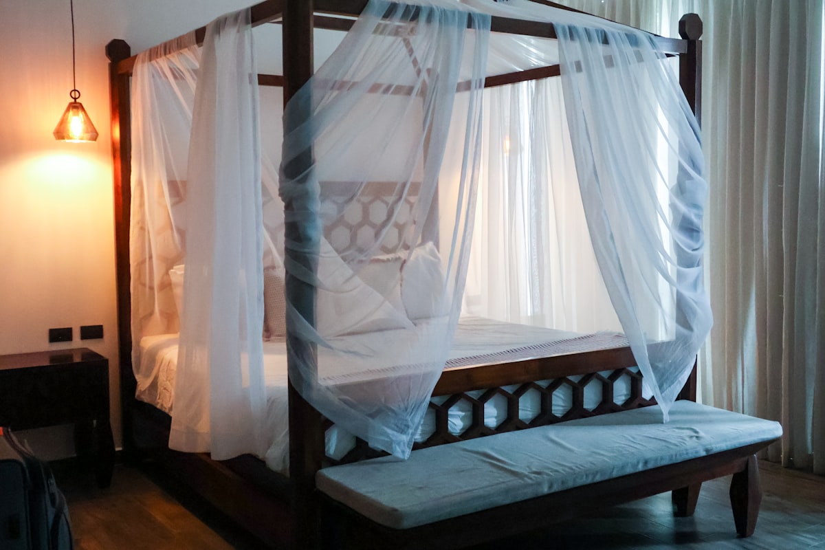Romantic bed in penthouse related to Elevate Your Sleep Experience with a King Size Canopy Bed