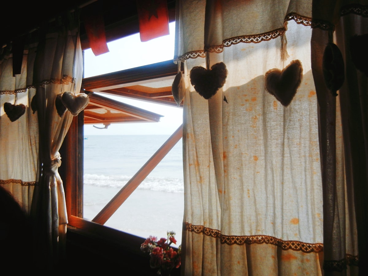 Rustic Window with Heart Curtains related to Country Curtain Valances for a Rustic Touch