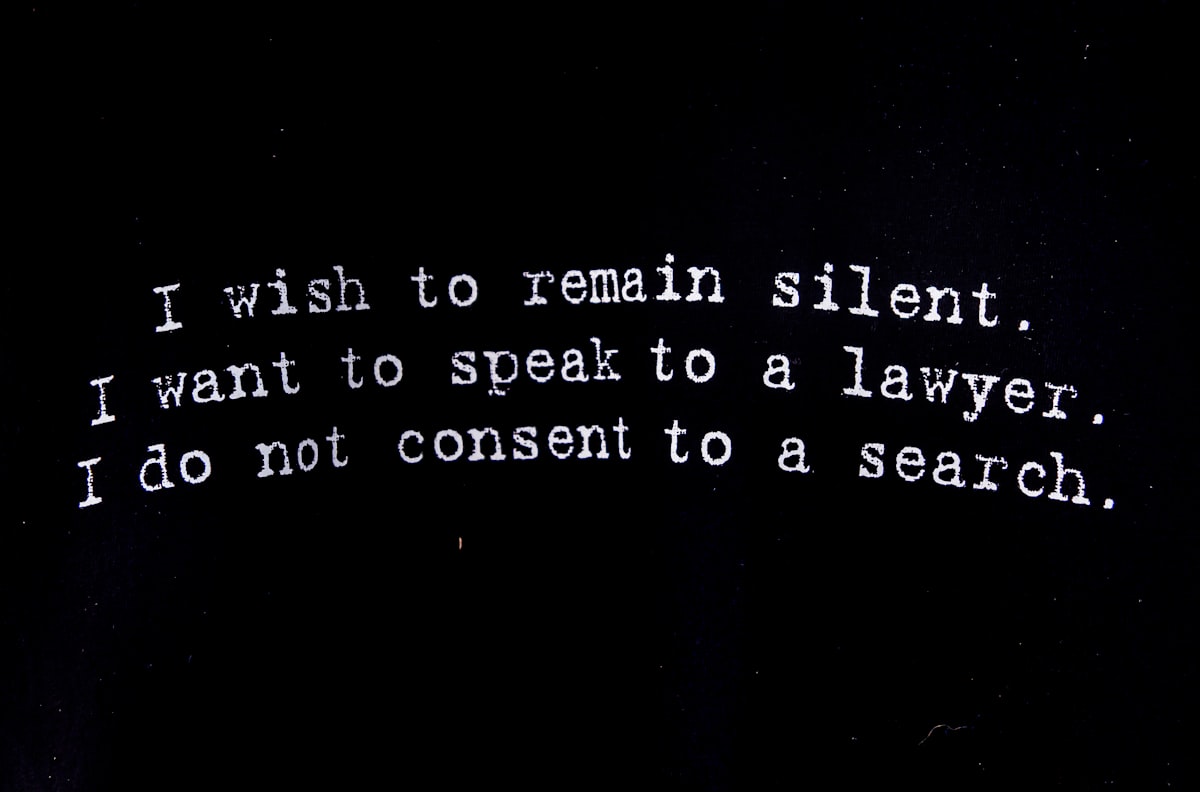 Sign specifying a person's rights: I wish to remain silent. I want to speak to a lawyer. I do not consent to a search. related to What Men Really Mean by 'What Do Men Want in Bed'?