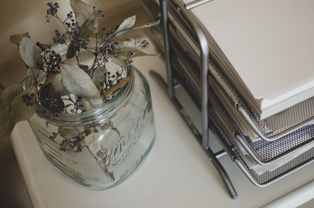 silver and black click pen on white table related to Shabby Chic Sideboards: Rustic Elegance for Your Home