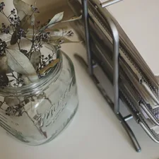 silver and black click pen on white table related to Shabby Chic Sideboards: Rustic Elegance for Your Home