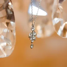 silver-colored diamond pendant necklace related to Delicate Light and Sophistication: The Charm of Bamboo Valance Curtains