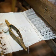 silver fish on white paper related to Antique Woven Coverlets