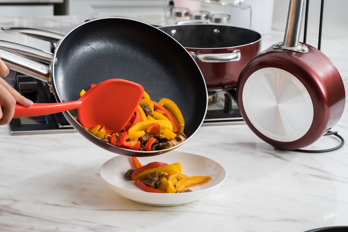 sliced fruit on black frying pan related to Red Kitchen Valances: Adding a Pop of Color to Your Cooking Space
