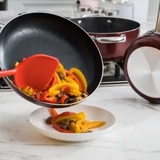 sliced fruit on black frying pan related to Red Kitchen Valances: Adding a Pop of Color to Your Cooking Space
