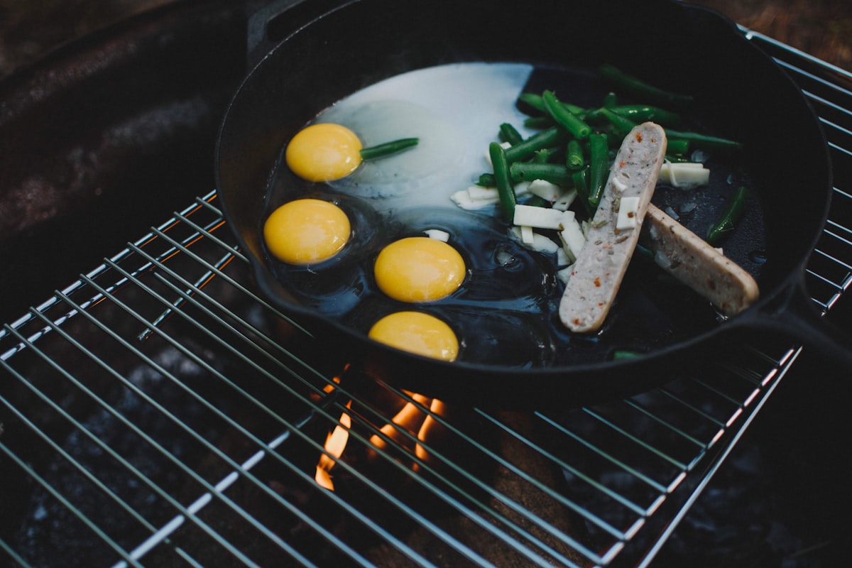 sliced vegetables on black frying pan related to Cozy Up with the Green Egg Chiminea