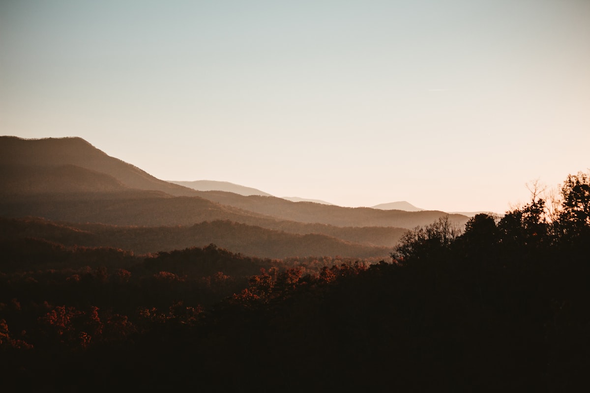 Smoky Mountains at sunset. related to A Cozy Escape: The Best Smoky Mountains Bed and Breakfast Inns