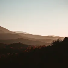 Smoky Mountains at sunset. related to A Cozy Escape: The Best Smoky Mountains Bed and Breakfast Inns