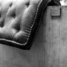 Soaking Wet Mattress. Fountain-Construction of Bronze and Concrete with the Title "Waterfall" (2013) by the french-italian artist Tatiana Trouvé. related to Leather Bed Bench - Luxury Sleeping Essentials