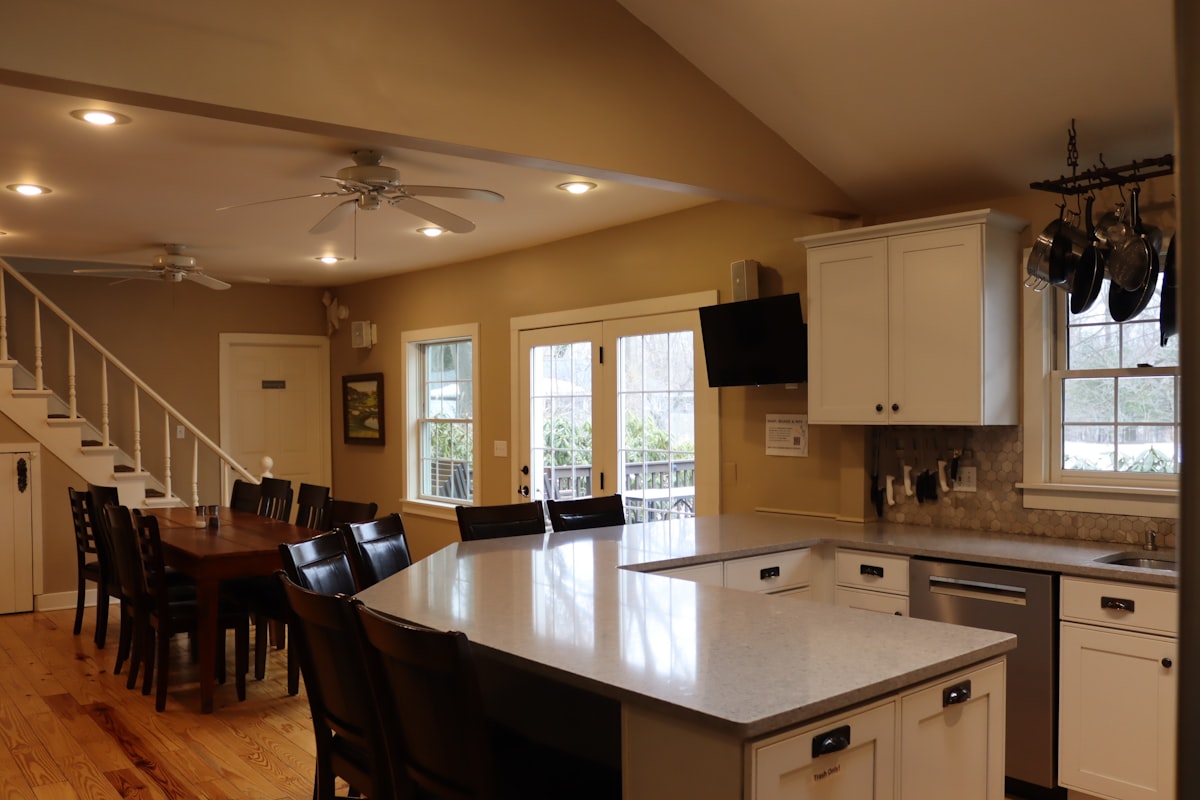 Spacious kitchen and dining area with island and island related to The Ultimate Guide to Breakfast in Bed Tables: Elevate Your Morning Routine