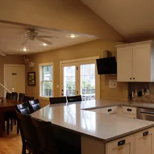 Spacious kitchen and dining area with island and island related to The Ultimate Guide to Breakfast in Bed Tables: Elevate Your Morning Routine