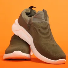 Sport shoes with orange background. related to Explore Comfortable and Stylish Full Size Beds