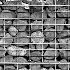 Stone Wall behind a garden fence related to The Warmth of the Rockies: The Ultimate Guide to Colorado Steel Chimineas
