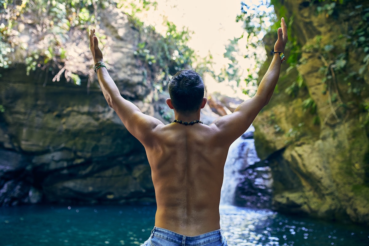 Strong, healthy man surrendering to water.  related to Natural Ways to Get Rid of Bed Bugs