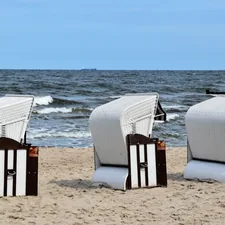 summer Mood beach life in beach chair
 related to The Ultimate Beach Bed Set: Comfort and Style by the Shore