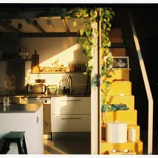 Sunlight streams into a modern kitchen with yellow stairs. related to Brighten Up Your Kitchen with Sunflower Valance Kitchen Curtains