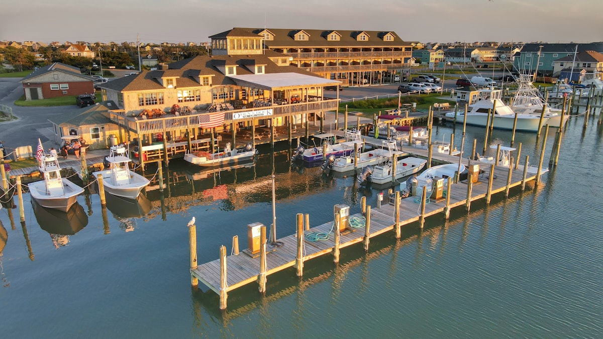 Sunset view of Oden's Dock marina at Hatteras Island on the Outer Banks of North Carolina. related to Unveiling the Experience at Bed Bath & Beyond Marina