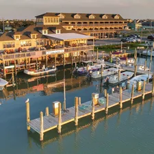Sunset view of Oden's Dock marina at Hatteras Island on the Outer Banks of North Carolina. related to Unveiling the Experience at Bed Bath & Beyond Marina