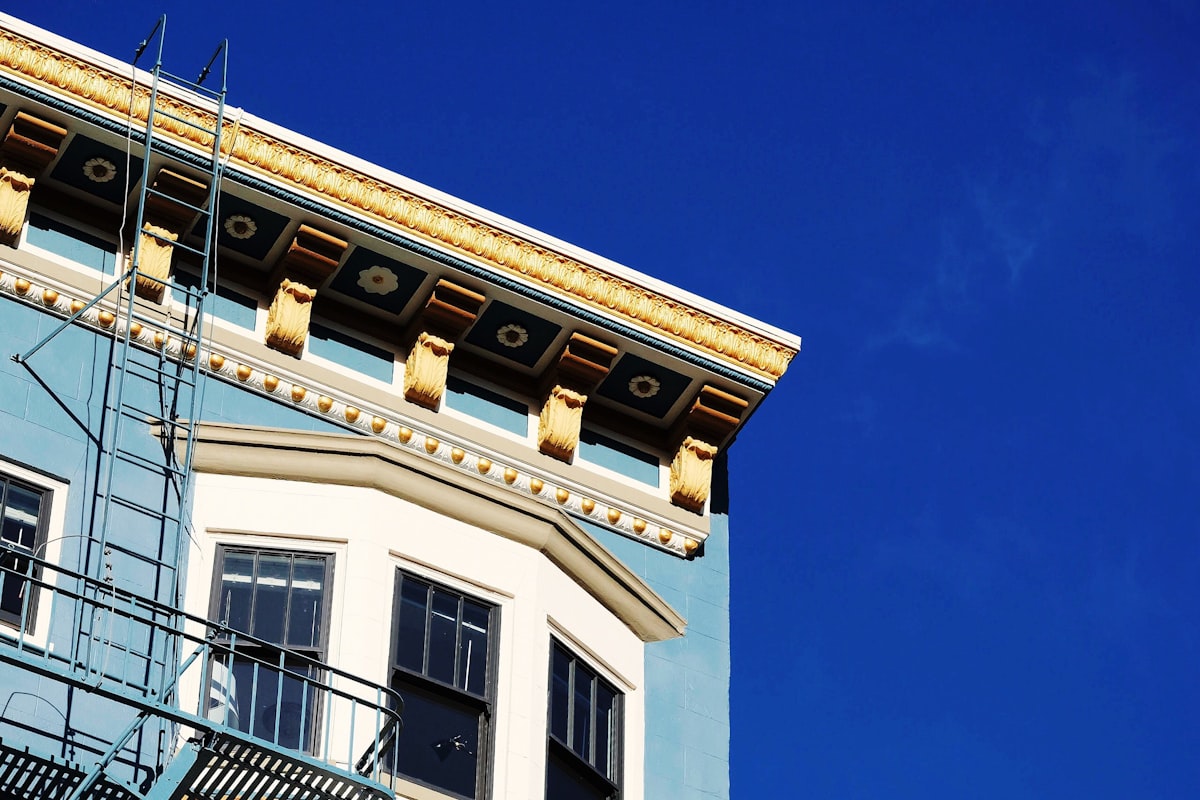 teal and white concrete building related to Building a Cornice Board Valance: A Comprehensive Guide