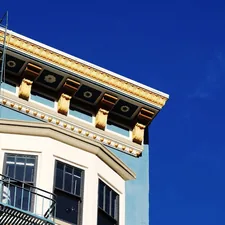 teal and white concrete building related to Building a Cornice Board Valance: A Comprehensive Guide
