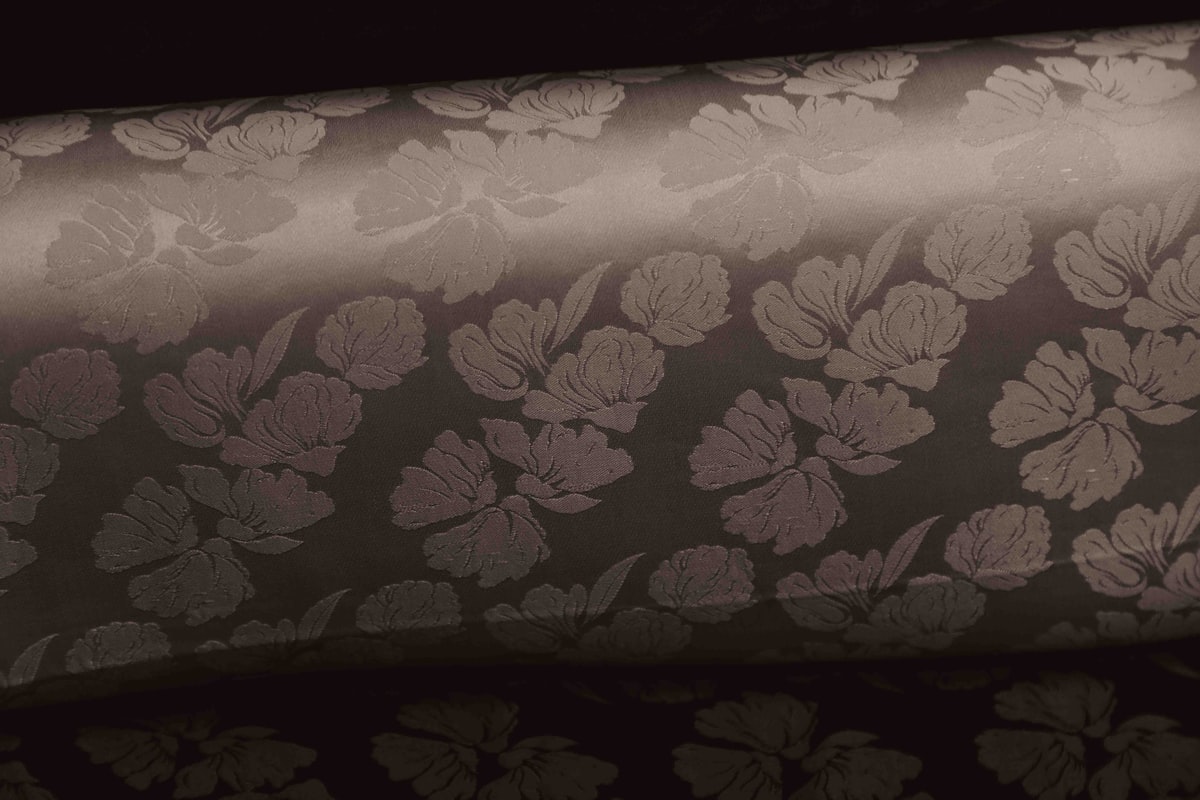 Textured fabric with a subtle floral pattern related to Black Damask Valance