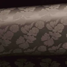 Textured fabric with a subtle floral pattern related to Black Damask Valance