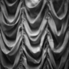 Textured gray fabric with vertical folds related to Elegant Gray Swag Valance for Your Home Decor