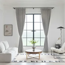 The perfect afternoon sun filters through EZcurtain's rich terracotta drapes, casting a gentle, moody glow throughout the living room. They offer just the right amount of light control and privacy, creating a serene and inviting atmosphere. Visit ezcurtain.com for more. Thanks for using our photos! If you include a link to our website: ezcurtain.com wherever you use it, it would be a huge help to us. For more photos, please contact collab@ezcurtain.com. related to Maximizing Style and Functionality: The Ultimate Guide to Drapes and Valance Sets
