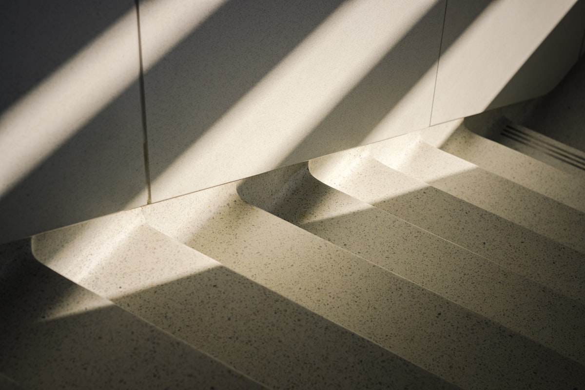 the shadow of a stair case on a wall related to Create a Beautiful Valance: A Step-by-Step Guide
