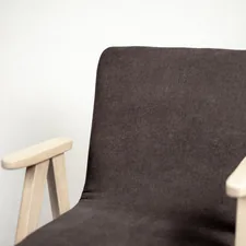 The wood chair with white background related to The Ultimate Guide to Recliner Bed Chairs: Comfort and Functionality Combined