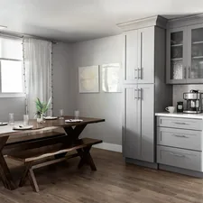 This charming space features a side kitchen table, perfect for quick meals. The stylish cupboard adds a touch of elegance related to Choosing the Perfect Kitchen Sideboard with Hutch for Your Home