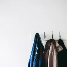 three jacket hanging on wall hooks related to Securely Hang Your Valances with Reliable Replacement Clips