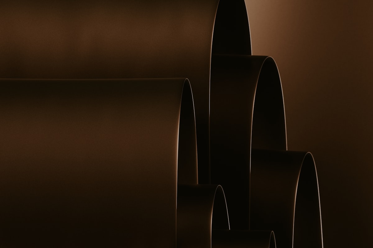 Three rolls of chocolate colored chocolate paper related to How Long Are Valances?