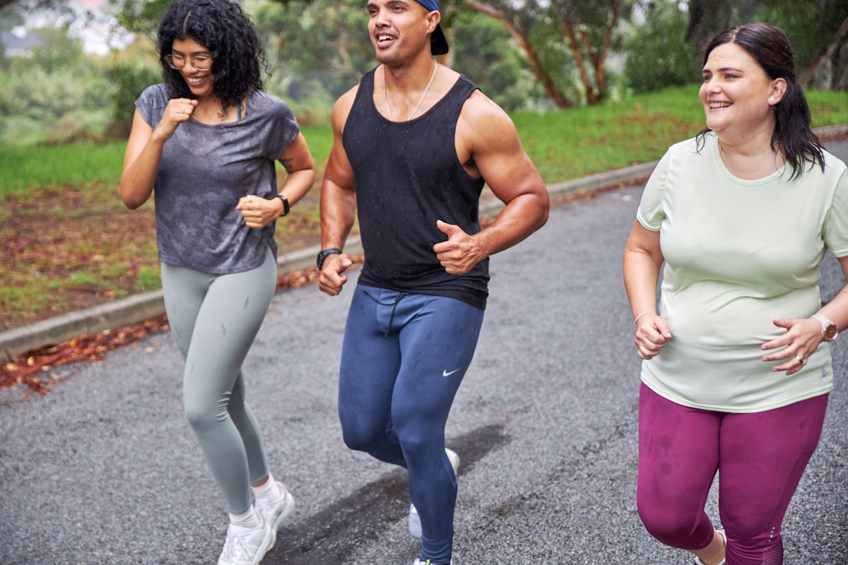 Three South African friends with diabetes enjoying a run related to Sure Fit Guaranteed