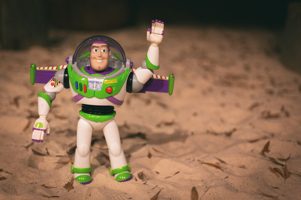 To infinity - of my sandbox. Buzz lightyear toy of the neighbor boy. related to Tying Up with Buzz: The Latest Buzz Lightyear Bed Trends