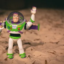 To infinity - of my sandbox. Buzz lightyear toy of the neighbor boy. related to Tying Up with Buzz: The Latest Buzz Lightyear Bed Trends
