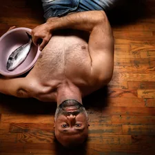 topless man wearing black denim jeans and black leather shoes related to Unlocking Intimacy: The Ultimate Guide to Pleasing Your Man in Bed