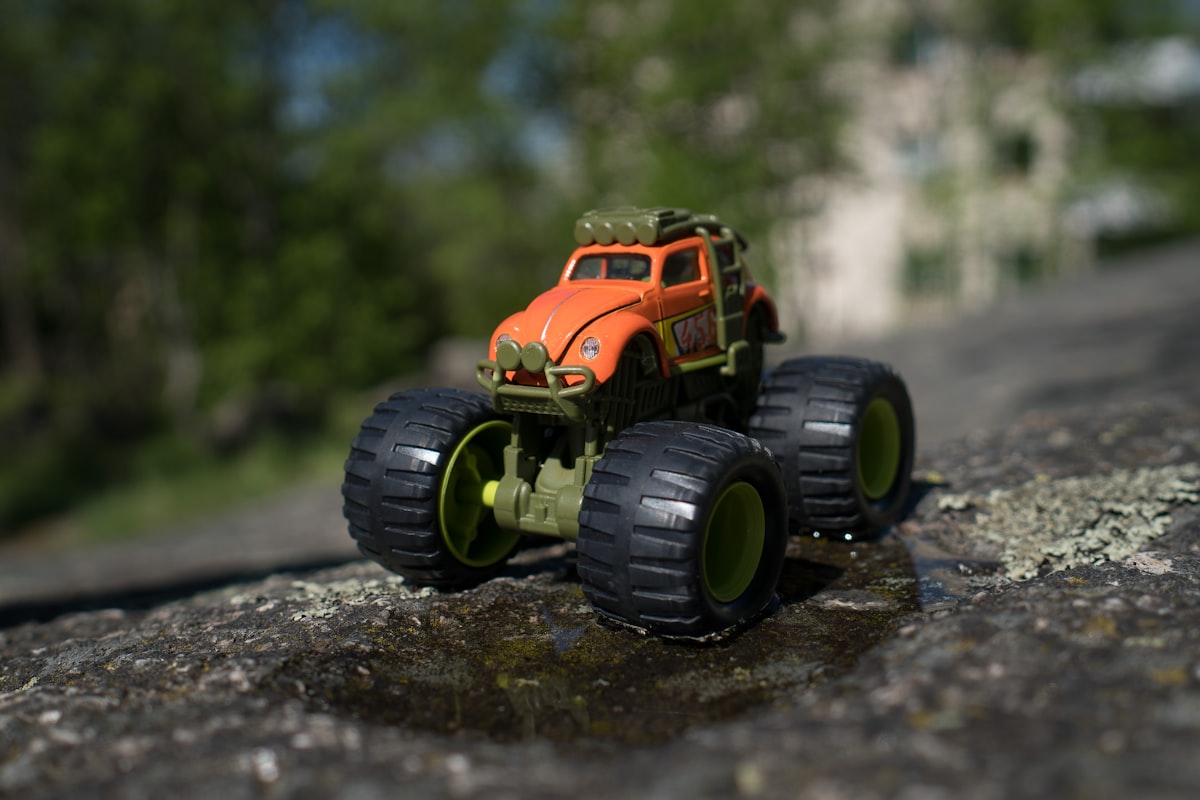 Toy car in the midst of a play. I appreciate donations for use related to Monster Truck Bed Designs for the Little Adventurer