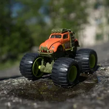 Toy car in the midst of a play. I appreciate donations for use related to Monster Truck Bed Designs for the Little Adventurer