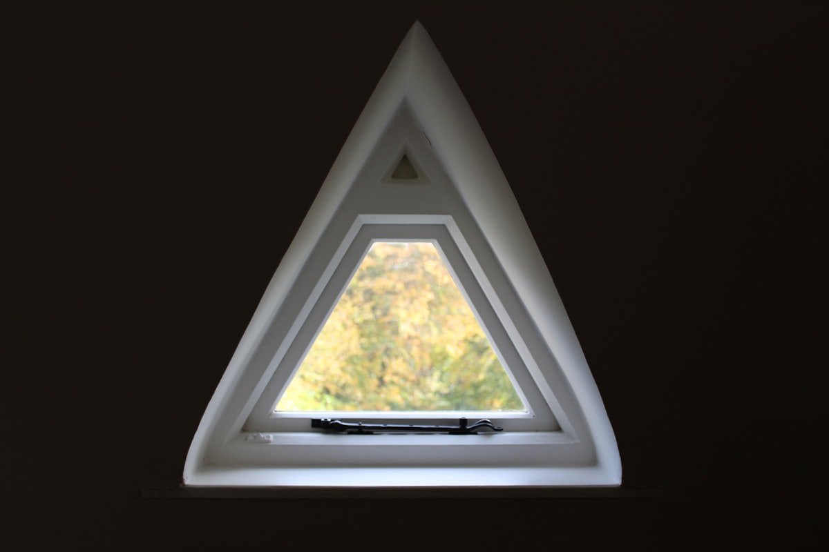 triangular white wooden frame related to Unusual Window Valances: Beyond the Ordinary