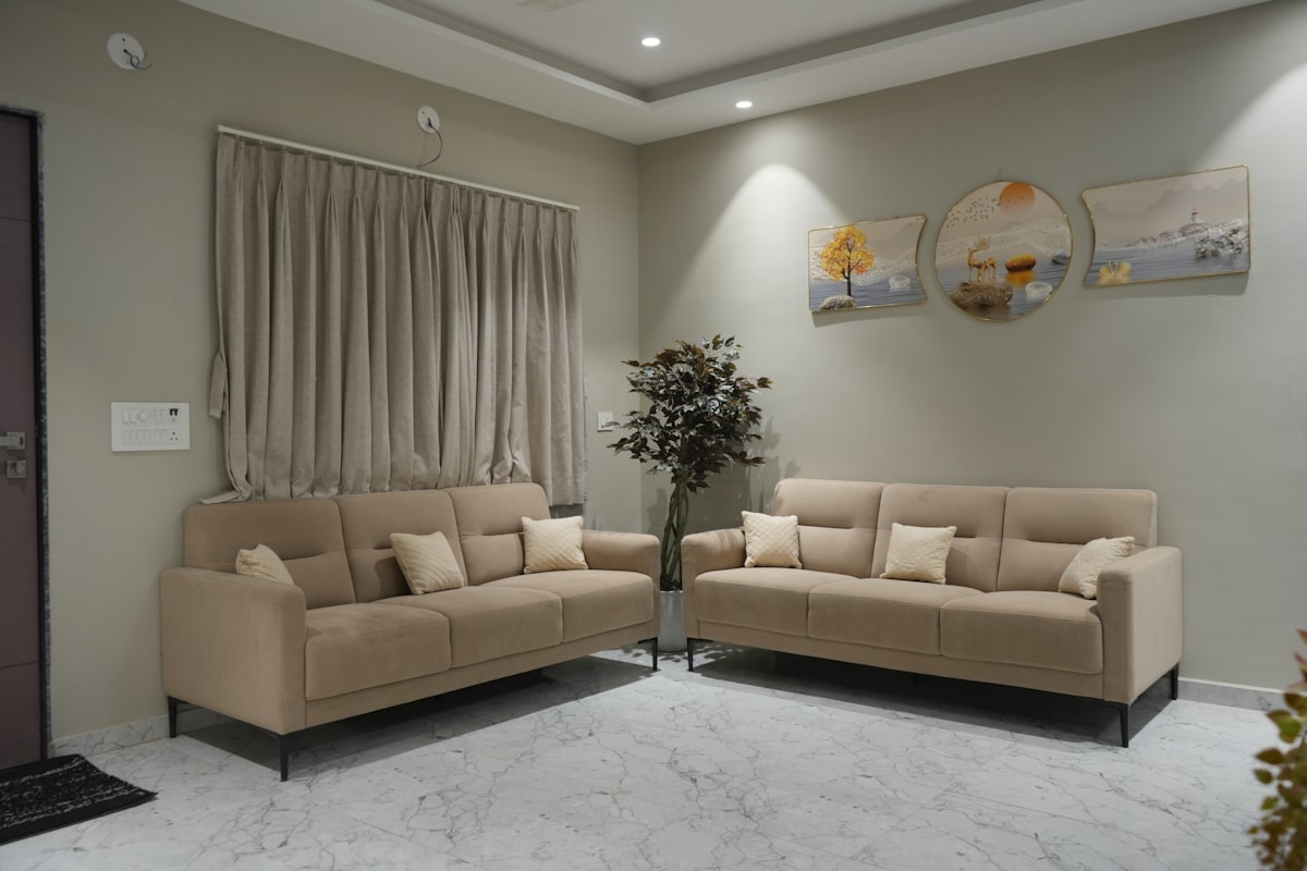 Two beige sofas in a modern living room. related to Full Size Sofa Bed: Ultimate Comfort for Your Home