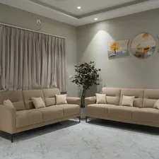 Two beige sofas in a modern living room. related to Full Size Sofa Bed: Ultimate Comfort for Your Home