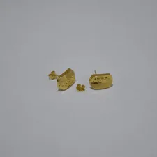 Two pairs of gold earrings on white background related to The Ultimate Guide to Choosing the Perfect Gold Bed Set