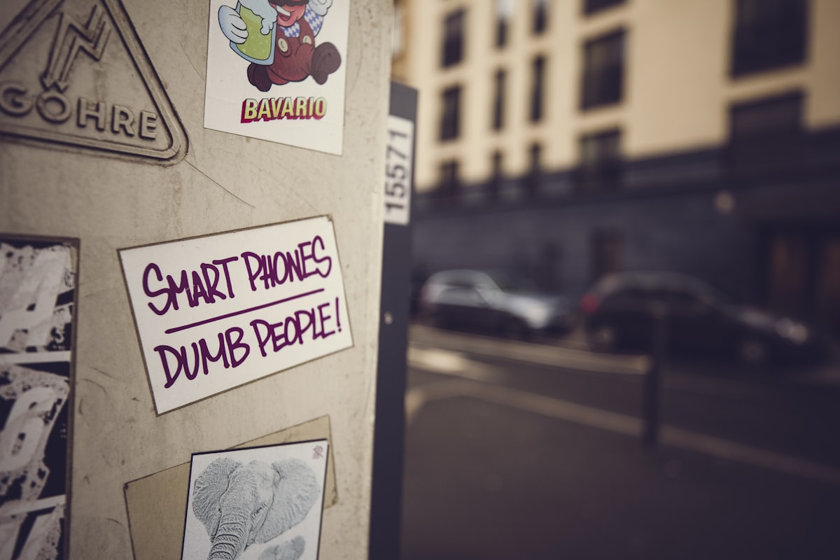 Urban street art sticker: SMART PHONES – DUMB PEOPLE – Technology criticism  related to 10 Smart Ways to Use a Trundle Bed IKEA for a Space-Efficient Home