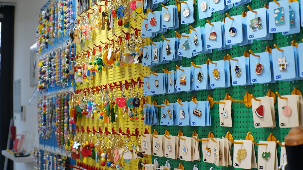 Wall display of colorful keychains and trinkets related to Exploring the Charm of Toy Story Valances: A Unique Home Decor Solution