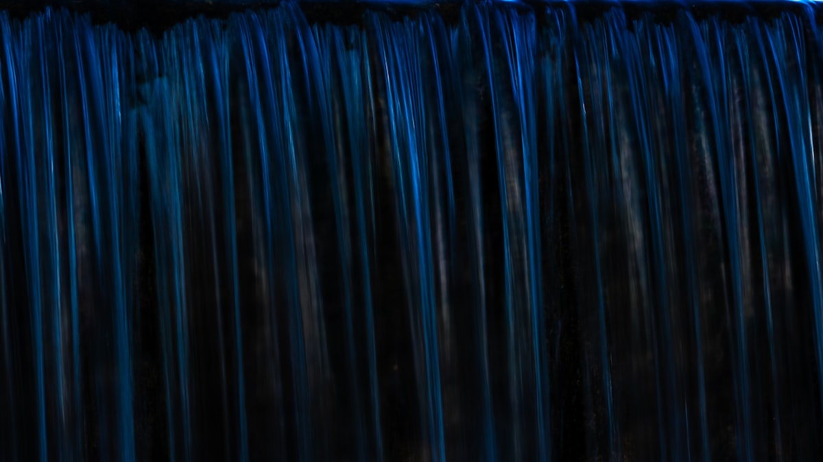 Water is flowing downwards, creating a beautiful waterfall. related to Curtains with Waterfall Valance