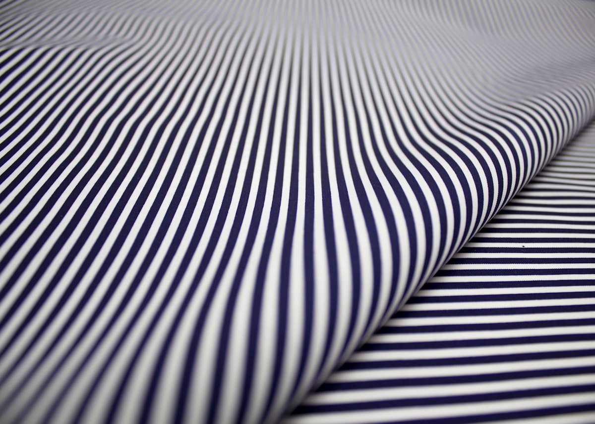 white and black striped textile related to Navy and White Coverlet: A Timeless Bedding Option