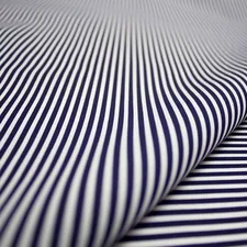 white and black striped textile related to Navy and White Coverlet: A Timeless Bedding Option